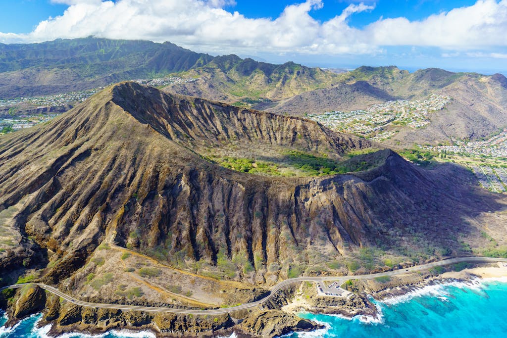 Stunning aerial view of Diamond Head volcanic crater overlooking the ocean in Hawaii.